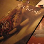 A stack of University of Chicago college pamphlets.