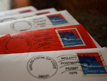 Photograph of college mail sent to prospective students. If you're on a college mailing list, they're more likely to accept you, right?