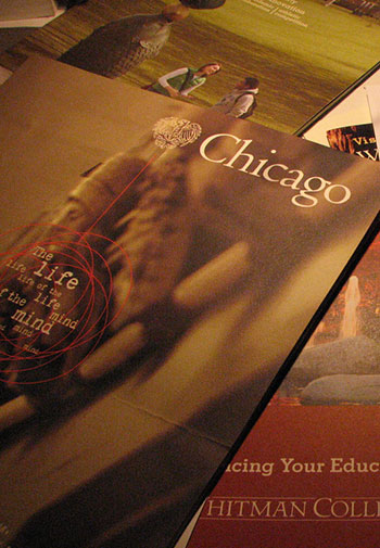 A stack of University of Chicago college pamphlets.