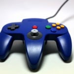 Close-up shot of a Blue Nintendo N64 Controller.