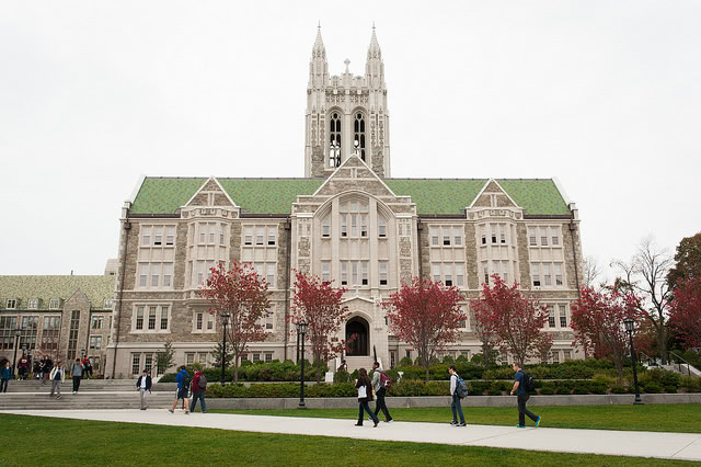 Students walking outside the O’Neill Library at Boston College.