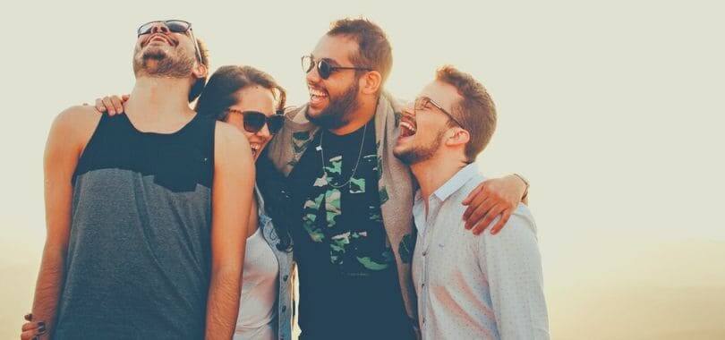 A group of students laughing together.