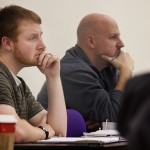 30 year old adult college students listening in a class lecture.