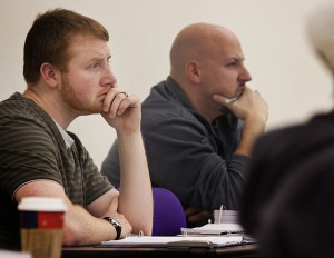 30 year old adult college students listening in a class lecture.