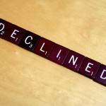 Scrambled letters arranged as the word "declined".