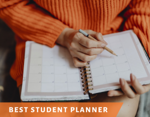 A college student writing down assignment due dates in her monthly planner.