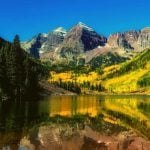 A lake in a forested mountain.