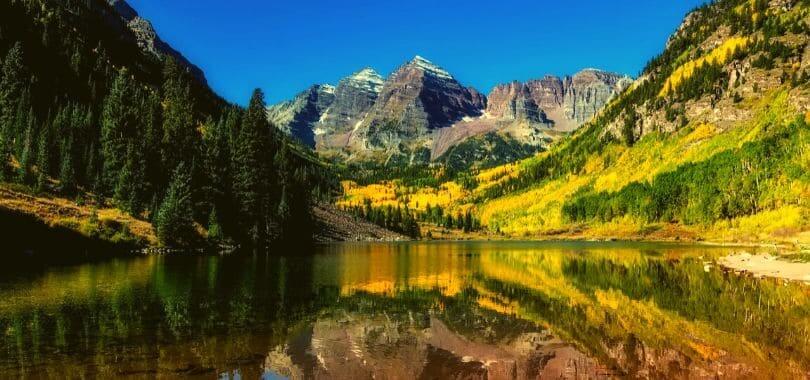 A lake in a forested mountain.