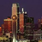 The Dallas city skyline at night.