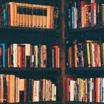 Multiple bookshelves filled with books.