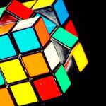A colorful Rubik's cube on its side.