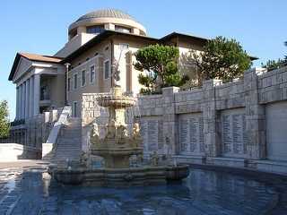 A water fountain in front of Soka University campus building.