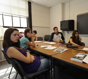 College students listening on a classroom lecture.