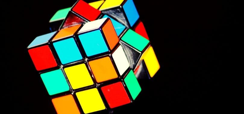 A colorful Rubik's cube on its side.