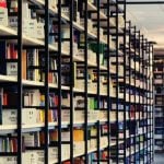 Rows of bookshelves filled with books.