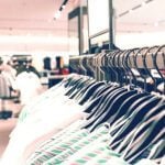 Clothing racks filled with clothes.