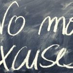 A chalkboard with writing that says "no more excuses."