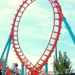 A red and blue rollercoaster with a loop.
