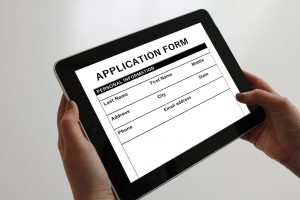 An online college application form in an iPad.