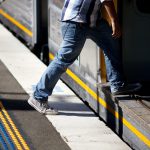 Student boarding a train.