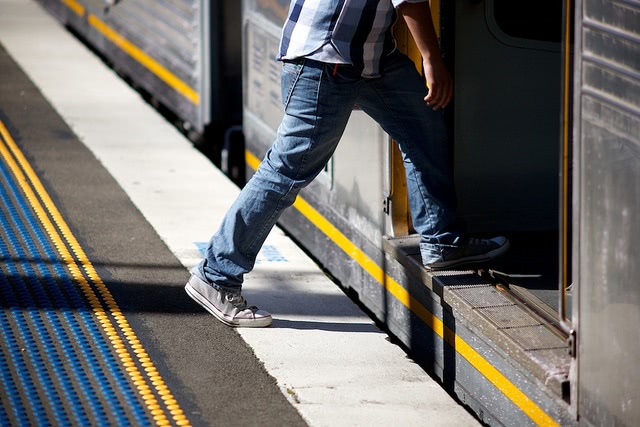 Student boarding a train.