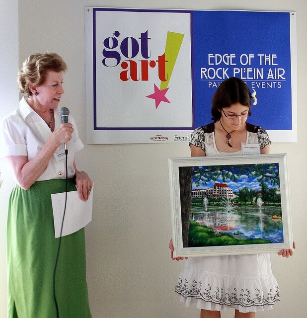 Student displays her painting in contest scholarships