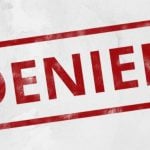 A gray background with red text that says "denied."