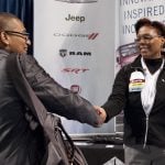 Man and woman shaking hands during Penn State Fall Career Days Fair.