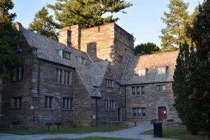 Swarthmore College campus building surrounded by trees.
