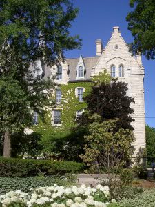 A building at Northwestern University covered trees.