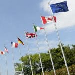 Flags on the pole of the G7 Summit.