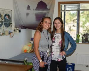 Here's how to decorate a dorm room with your roommate.