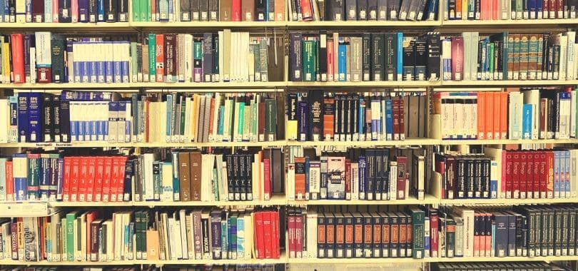 Books filling multiple bookshelves.