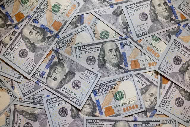 Pile of 100 dollar bills.