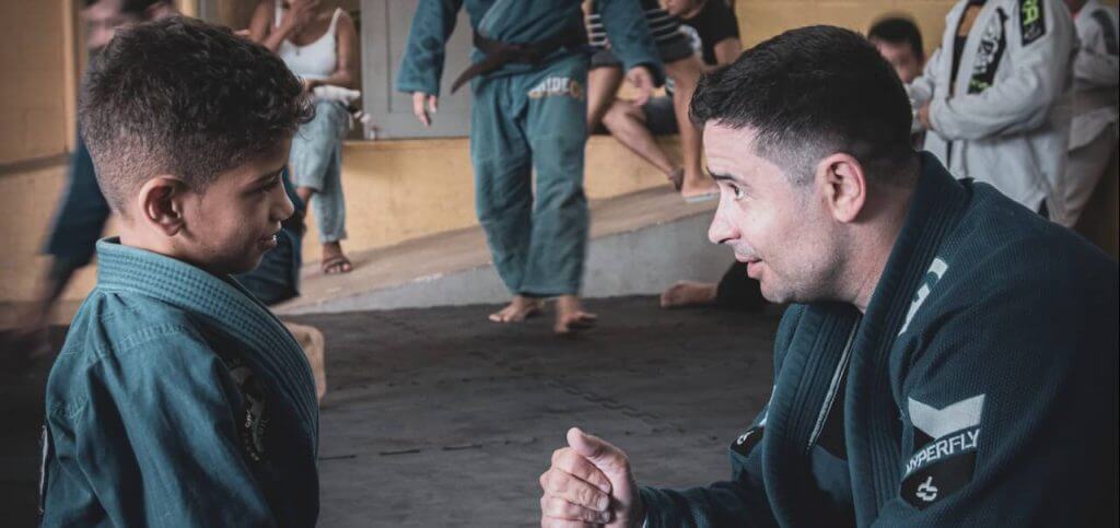 A tutor talking to a child.