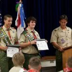 Boy scouts on the states receiving their awards.