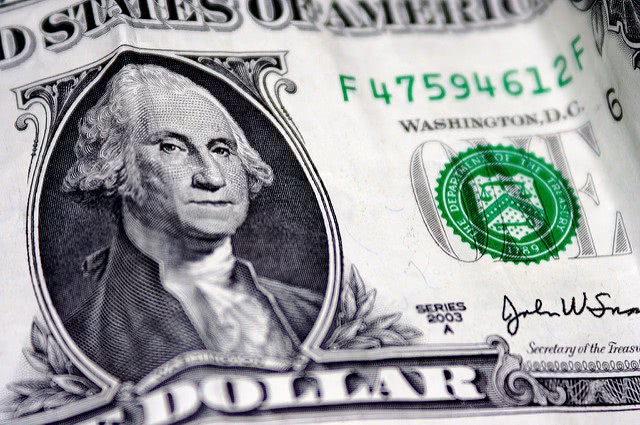 Close up of George Washington in one dollar bill.