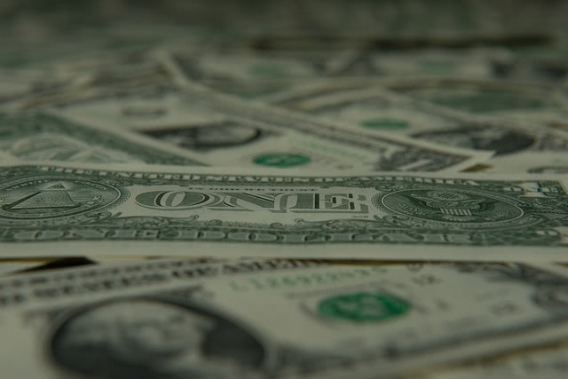 A pile of one-dollar bills.
