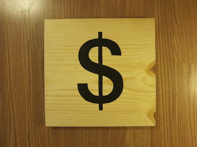 dollar symbol on the wood