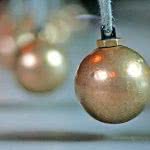 Portrait of gold Christmas balls.