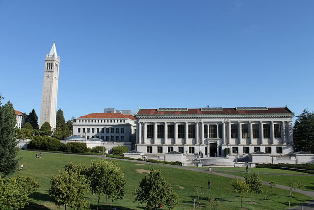 UC Berkeley Campus building and lawn on the foreground.