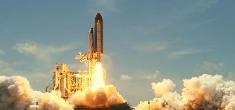 A rocket launching into space.