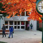 Students walking around Iosue Student Union campus on a fall afternoon.