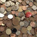 An assortment of coins - how to get out of student loan debt