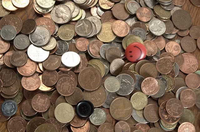 An assortment of coins - how to get out of student loan debt