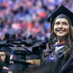 Student at graduation - in terms of paying for college, there are things you should know about Sallie Mae student loans