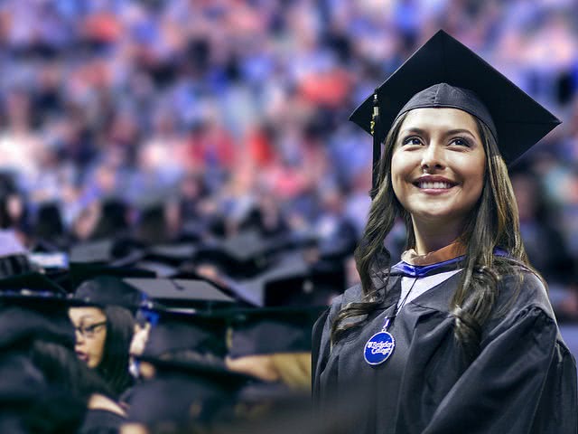 Student at graduation - in terms of paying for college, there are things you should know about Sallie Mae student loans