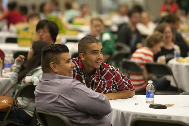 Two students visiting a college to show demonstrated interest