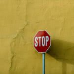 Stop sign - you can prevent student loan default by stopping it before it starts