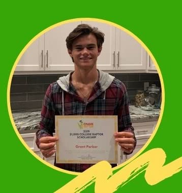 Scholarship Winner Grant Parker posing with certificate